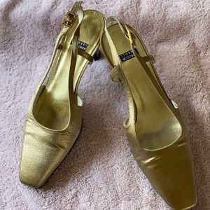 Stuart Weitzman gold pumps